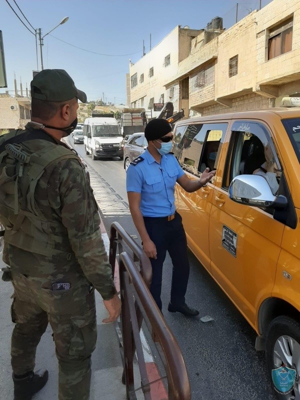 بالصور.. الشرطة تكثف جهودها لكسر منحنى وباء  كورونا