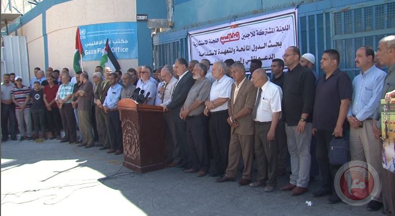 غزة- لجان اللاجئين تنظم وقفة رفضا لنقل صلاحيات الاونروا