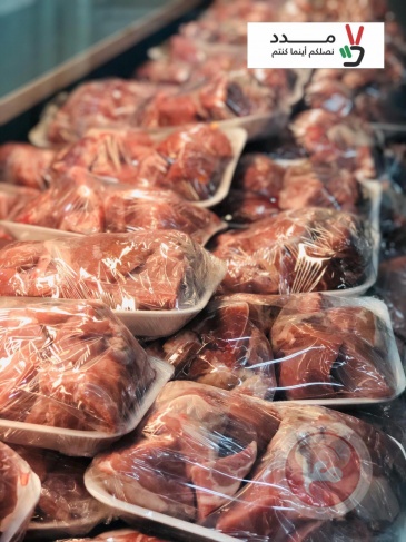 مدد تواصل توزيع اللحوم وكسوة العيد في القدس 