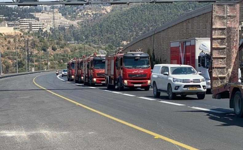 الدفاع المدني الفلسطيني يشارك باطفاء الحرائق في القدس