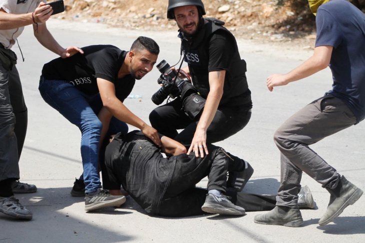 10 injured by the occupation bullets during the suppression of the Kafr Qaddum march