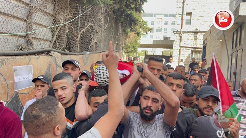 Photos - Citizens mourn the body of the martyr Amr Abed in Beitunia