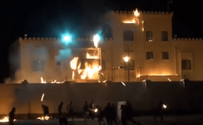 Protesters burn the Israeli embassy in Bahrain