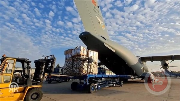 A Kuwaiti and Kenyan aid plane arrives at Al-Arish International Airport