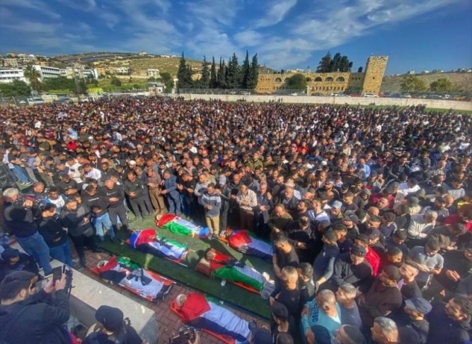 Huge crowds mourn the bodies of the six martyrs in Al-Faraa camp