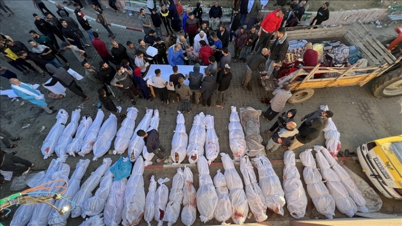The occupation army hands over the bodies of 80 martyrs after they were kidnapped from Gaza