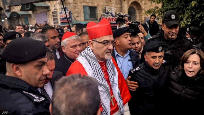 The Latin Patriarch of Jerusalem arrives at the Church of the Nativity in a “silent procession”