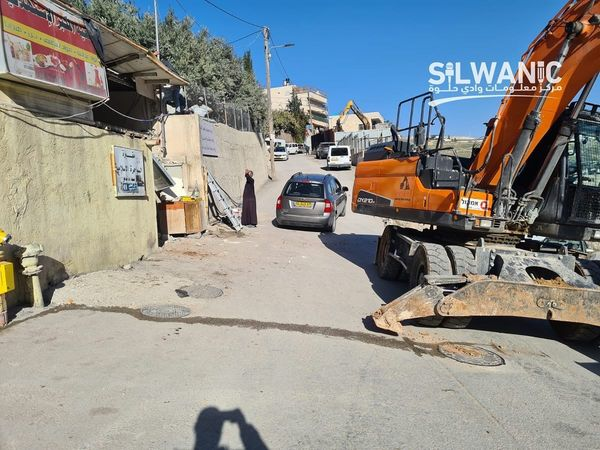Forcing a Jerusalemite family to demolish their shop with their own hands