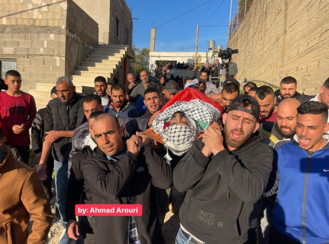 Large crowds mourn the body of the martyr Ahmed Muhareb in the town of Abwein, north of Ramallah