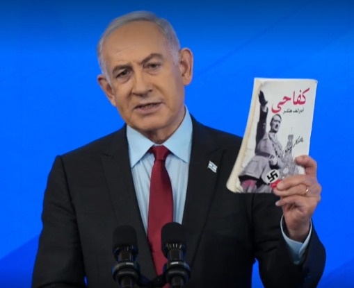 In his press conference.. Why did Netanyahu carry the book “Mein Kampf”?  For Hitler?