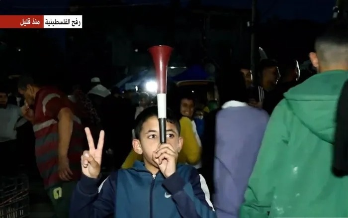 Rafah residents celebrate Hamas' agreement to a ceasefire