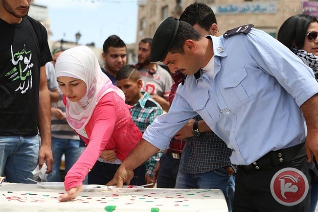 مشروع بصمة يسعى لدخول &quot;غينتس&quot; بتوقيعات على علم فلسطين