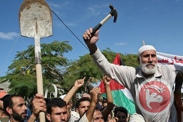 كتلة نضال العمال بقطاع غزة تدعو إلى تبني الحقوق العمالية  