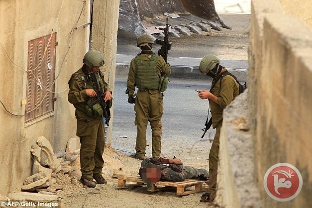 &quot;هآرتس&quot;: لا محاكمة للجنود الإسرائيليين على قتل الفلسطينيين