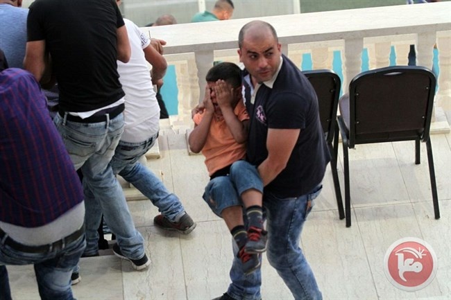 &lt;div&gt;صورة وتعليق: &lt;/div&gt;الاحتلال يلقي قنابل غاز في ملعب الرام خلال مباراة بلاطة والظاهرية