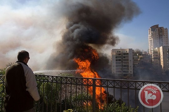 شرطة اسرائيل تعتقل 14 فلسطينيا بتهمة اشعال النيران
