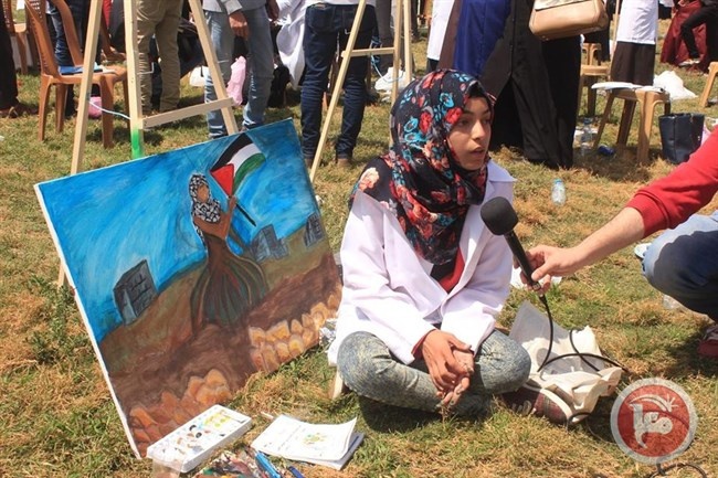 &quot;آية مغاري&quot; رسامة فلسطينية تجسد الثورة والفن بلوحاتها