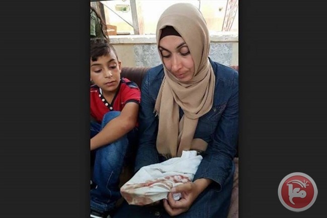 الاحتلال يمدد اعتقال والدة الشهيد أبو غنام